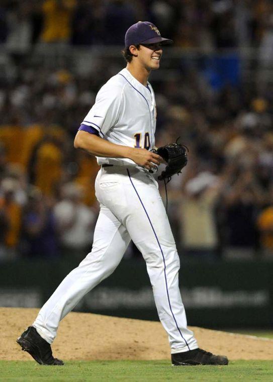 LSU sophomore pitcher Aaron Nola (10) grins June 7, 2013 after the final out is recorded in the Tigers' 2-0 shutout victory against the Oklahoma Sooners in Alex Box Stadium. Nola pitched all nine innings and is the first LSU pitcher to throw a shutout in an NCAA Tournament game since Lane Mestepy in 2004.
 