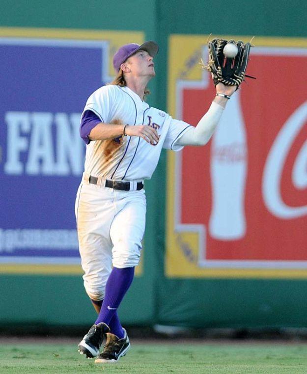 LSU senior outfielder Raph Rhymes (4) catches a fly ball June 7, 2013 during the Tigers' 2-0 win against Oklahoma in Alex Box Stadium.
 