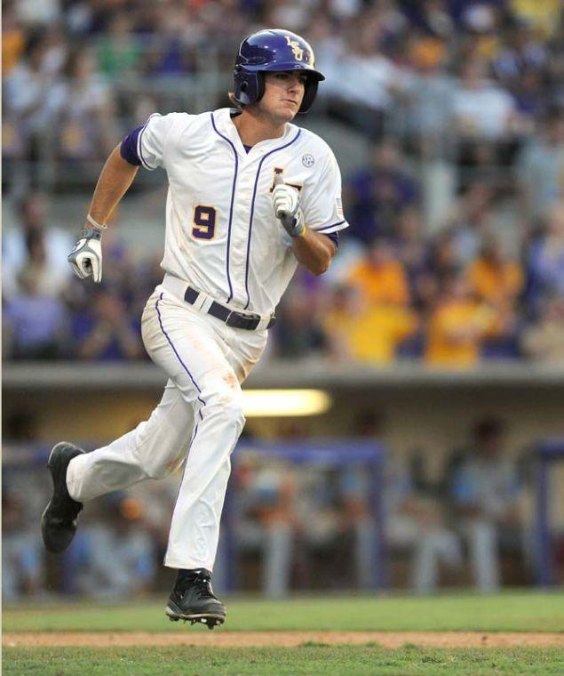 LSU freshman outfielder Mark Laird (9) sprints toward first base June 7, 2013 during the Tigers' 2-0 win against Oklahoma in Alex Box Stadium.
 