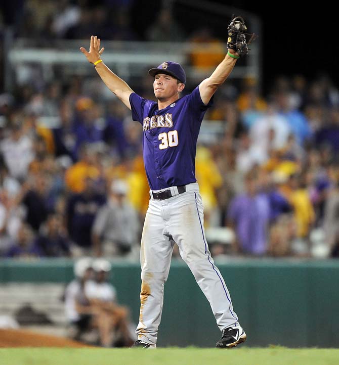 LSU freshman infielder Alex Bregman (30) raises his arms June 1, 2013 after catching the final out of the Tigers' 8-5 win against Sam Houston in Alex Box Stadium.
 