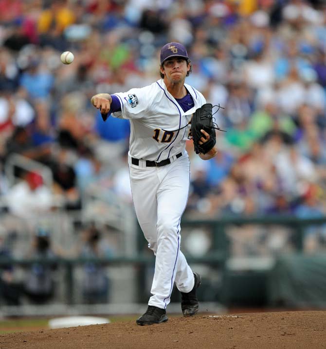 LSU sophomore right-handed pitcher Aaron Nola (10) throws the ball to first base June 16, 2013 during LSU's 1-2 loss against UCLA at the College World Series in TD Ameritrade Park.
 