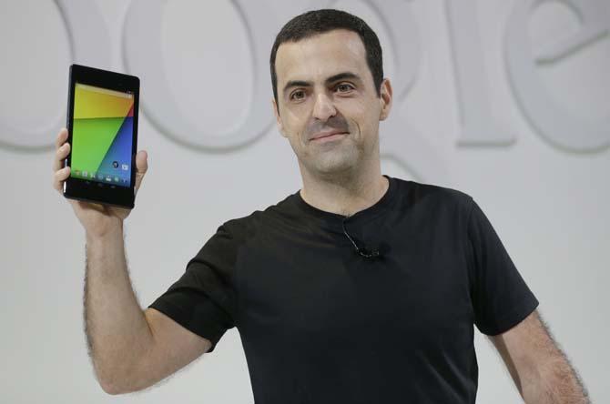 Hugo Barra, vice president Android product management at Google, displays the new Nexus 7 tablet on Wednesday, July 24, 2013, in San Francisco. (AP Photo/Marcio Jose Sanchez)