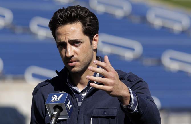 FILE - In this Feb. 24, 2012 file photo, Milwaukee Brewers' Ryan Braun speaks during a news conference at baseball spring training in Phoenix. The 2011 National League MVP was suspended without pay for the rest of the season and the postseason Monday, July 22, 2013, the start of sanctions involving players reportedly tied to a Florida clinic accused of distributing performance-enhancing drugs. (AP Photo/Jae C. Hong, File)