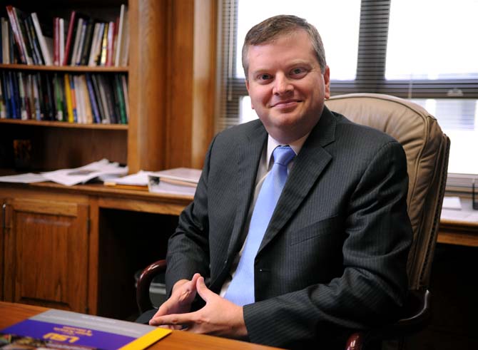 Damon Andrew, newly hired Dean of the LSU College of Human Sciences &amp; Education, sits in his desk July 10, 2013 in Peabody Hall.