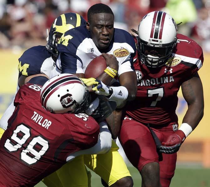 South Carolina junior defensive end Jadeveon Clowney's (7) EPSY-winning hit against Michigan in the Outback Bowl in January would have gotten him ejected from the game, according to a new NCAA rule about targeting players. AP Photo/Chris O'Meara