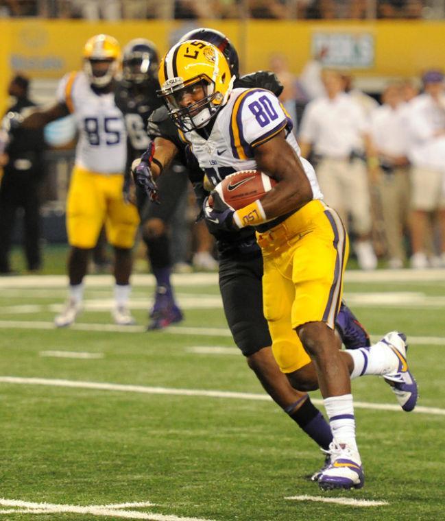 LSU junior wide reciever Javis Landry (80) scores a touchdown during the Cowboys Classic on Aug. 31, 2013 at AT&amp;T Stadium in Dallas, Texas.