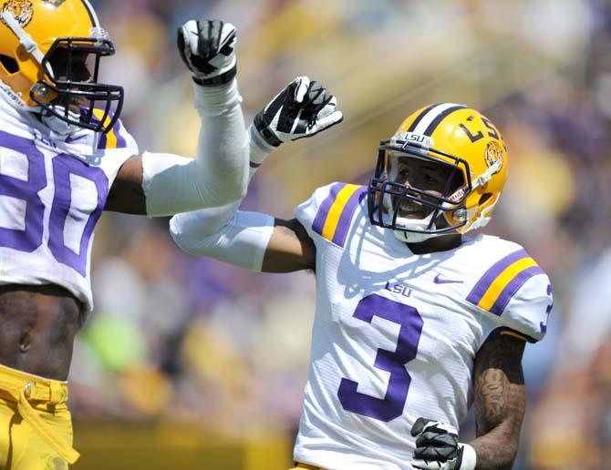 LSU junior wide receiver Odell Beckham Jr. (3) celebrates a touchdown for the white squad with junior wide receiver Jarvis Landry (80) Saturday, April 20, 2013 in the National L Club Spring Game in Tiger Stadium.