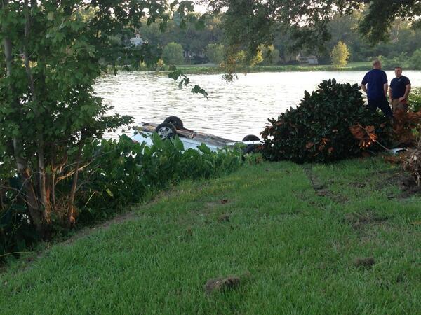 A car flipped into the University Lake Tuesday around 6 p.m. Witnesses say the car was being chased by a police car