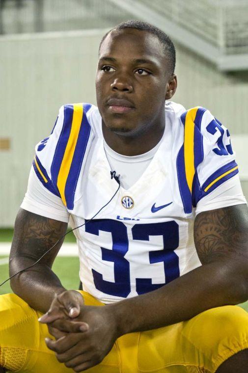 LSU sophomore running back Jeremy Hill (33) waits to respond to questions from various media outlets Sunday, August 11, 2013 during LSU Football Media Day in the Charles McClendon Practice Facility.