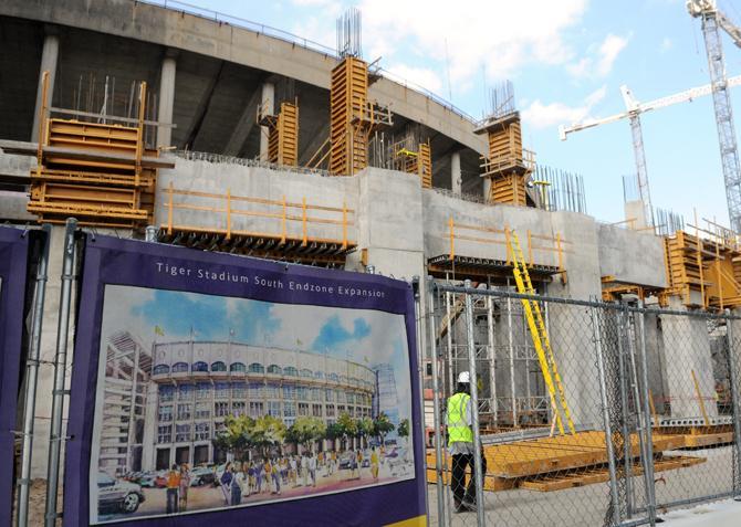 Construction workers continue to work on the south side of Tiger Stadium on Aug. 27, 2013 as part of the Tiger Stadium South Endzone Expansion Project.