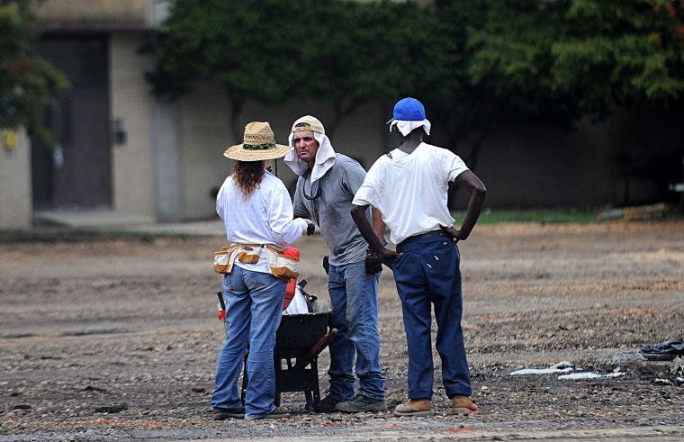 Workers begin constructing the new Cypress Residential Hall on Thursday, August 22, 2013 in the Hart Lot.