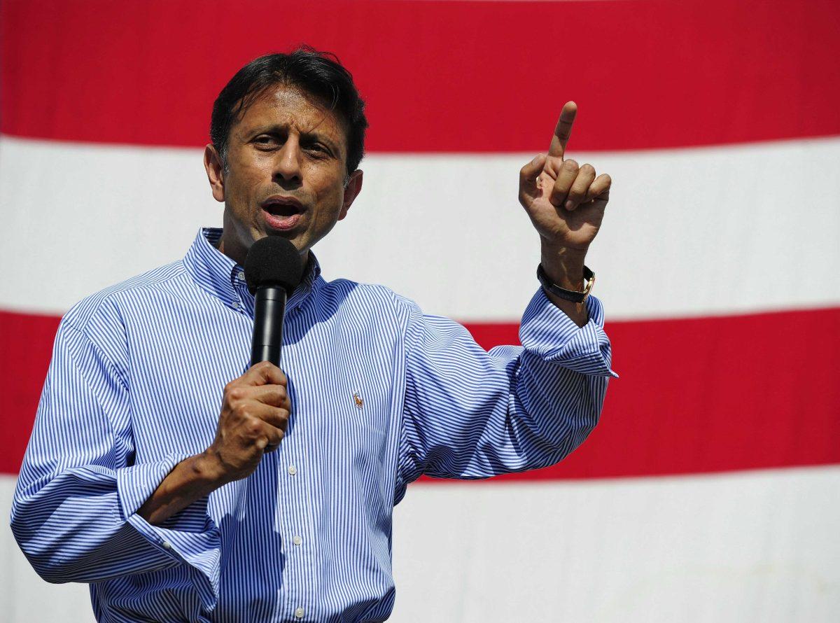 Louisiana Gov. Bobby Jindal speaks during a rally for South Carolina Republican Gov. Nikki Haley, who announced her candidacy for a second term at the Bi-Lo Center, Monday, Aug. 26, 2013, in Greenville, S.C. Supporting Gov. Haley were Perry, Bobby Jindal-La. and Scott Walker-Wis. (AP Photo/ Richard Shiro)