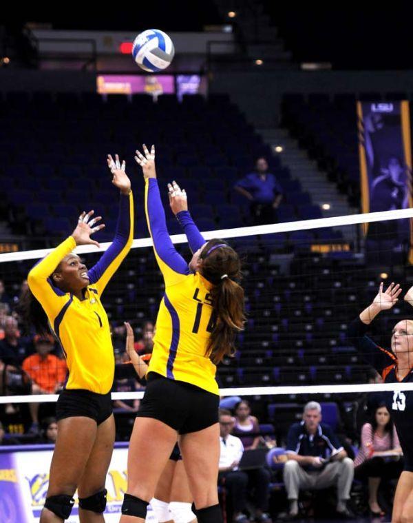 Sophomore, Khourtni Fears (left), and Junior, Malorie Pardo (right) volley Friday Aug. 30, 2013 against Texas San-Antonio in their 3-1 victory