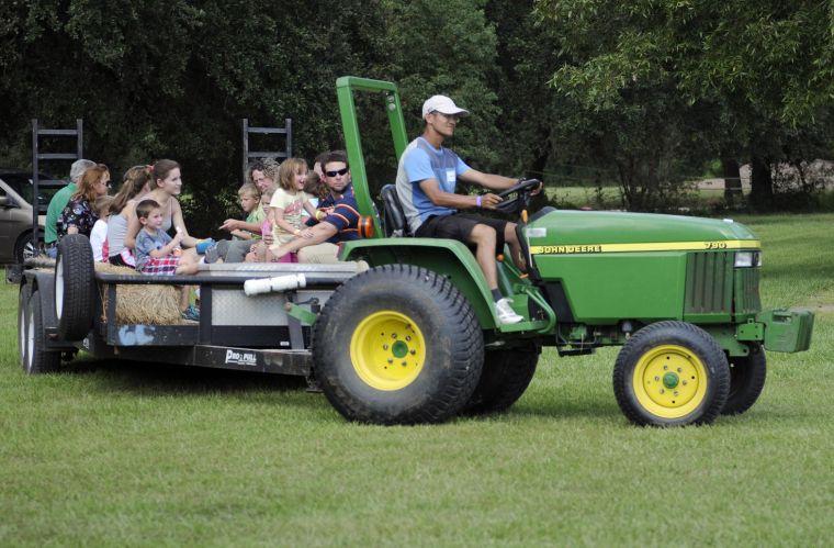 Children and parents enjoy a hayride Saturday, Sept. 28, 2013 at the Corn Maze at LSU AgCenter Botanic Gardens at Burden.