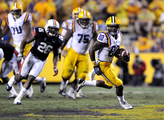 LSU junior wide receiver Jarvis Landry (80) maneuvers downfield Saturday, Sept. 21, 2013 during the Tigers' 35-21 victory against Auburn in Tiger Stadium.