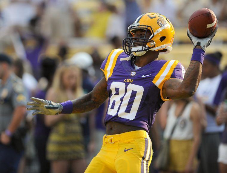 LSU junior wide receiver Jarvis Landry (80) runs drills before the Tigers' victory against Kent State on Saturday night, Sept. 14, 2013.