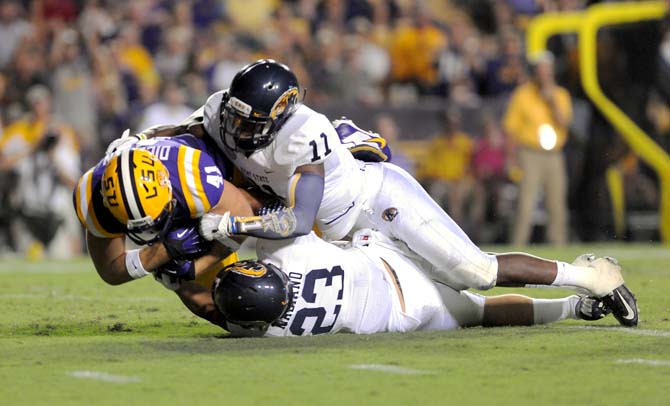 LSU junior tight end Travis Dickson (41) runs the ball Saturday, Sept. 14, 2013, during the Tigers victory in Tiger Stadium