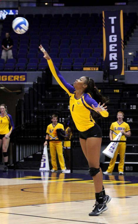 Sophomore, Khourtni Fears (1), serves Friday Aug. 2013, against the Tiger's match series against Texas San Antonio