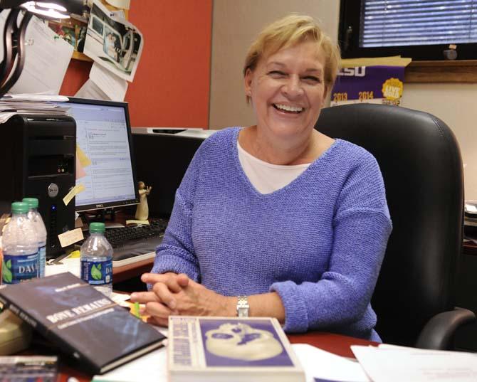 LSU forensic anthropologist Mary Manheim smiles on Thursday, September 12, 2013, during an interview about her new book "Bone Remains: Cold Cases in Forensic Anthropology" in her office in Howe Russell.