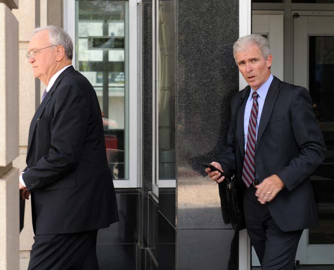 LSU System&#8217;s lead legal counsel Shelby McKenzie (left) and Attorney Jimmy Faircloth (right) exit after a new hearing in The Times-Picayune and The Advocate vs. LSU lawsuit Monday Sept. 16, 2013, at the 19th Judicial District Courhouse, Baton Rouge, La.