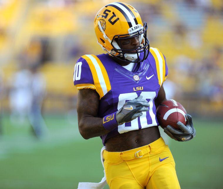 LSU junior wide receiver Jarvis Landry (80) runs drills before the Tigers' victory against Kent State on Saturday night, Sept. 14, 2013.