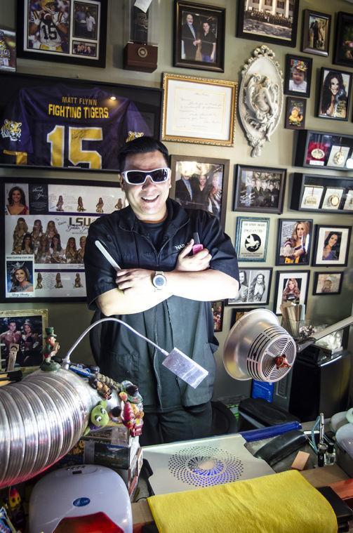 Kevin Nguyen sponsors many of his clients that are in pagents, LSU teams, or local events. He displays their photographs throughout his salon.