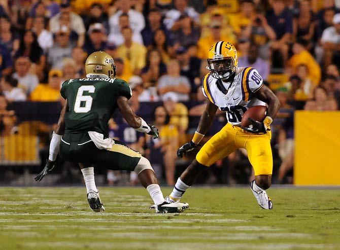 LSU junior wide reciever Jarvis Landry (80) squares off with UAB freshman safety Nick Jackson (6) Sept. 7, 2013 during the Tigers' 56-17 victory against the Blazers in Tiger Stadium.