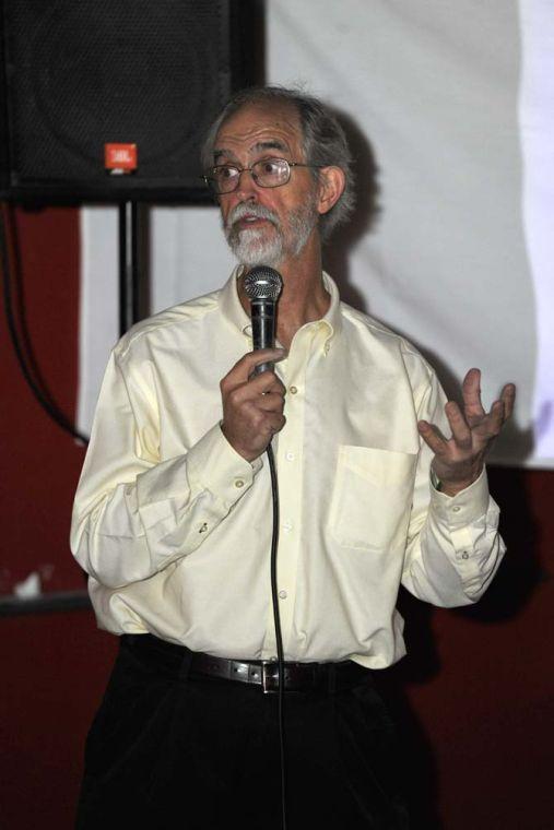 LSU Ernest and Alice Neal Professor of Geology, Jeffrey Nunn, speaks to fellow students and Baton Rouge locals Tuesday, Sept. 24, 2013 at Chelsea's Caf&#233; about the Louisiana sinkhole and it's expansions during the monthly LSU Science Caf&#233; talks. FEEL FREE TO CORRECT THIS