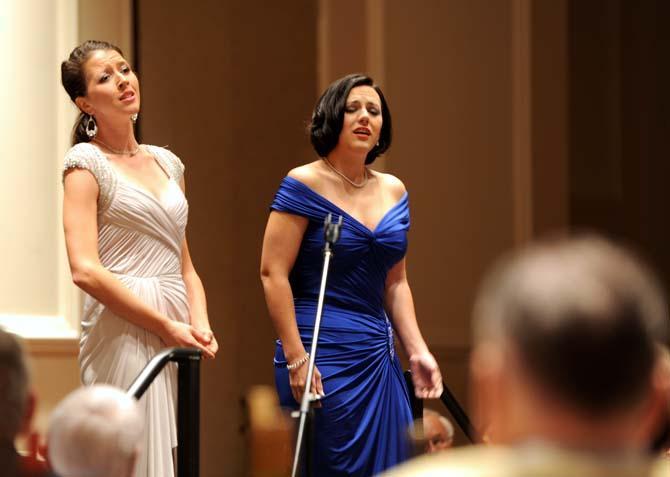 LSU Alumnea Lisette Oropesa (left) and Daniela Mack (right) belt out their repetoir Sunday, Sept. 8, 2013 at a gala concert banquet held at the Crowne Plaza Hotel.