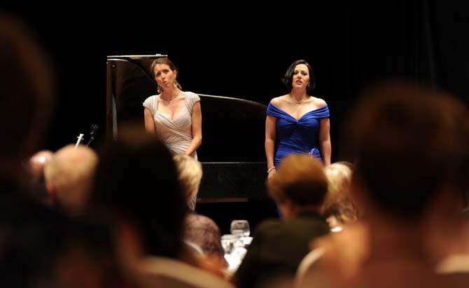 LSU Alumnea Lisette Oropesa (left) and Daniela Mack (right) belt out their repetoir Sunday, Sept. 8, 2013 at a gala concert banquet held at the Crowne Plaza Hotel.