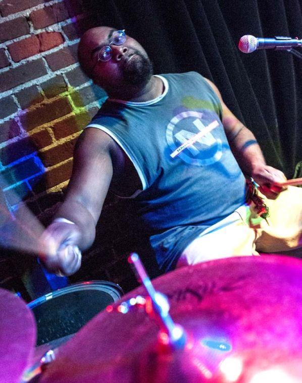 Chris Lee, drummer for intergalactic space funk band Captain Green, jams on stage Saturday, Sept. 14, 2013 at The Spanish Moon.