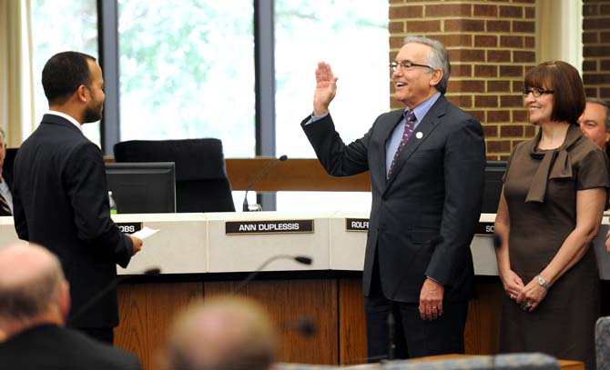 Chairman Robert Yaborough is sworn in at a Board of Supervisors meeting Friday, September 6, 2013 in the LSU Systems Building.