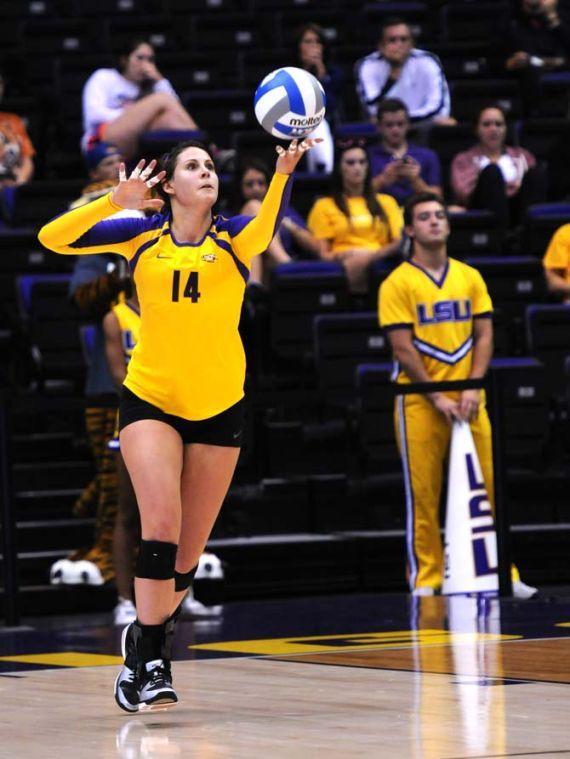 Junior, Malorie Pardo, serves Friday Aug. 30, 2013 against Texas San Antonio. The Lady Tigers took home a victory 3-1. *check to see if thats correct*