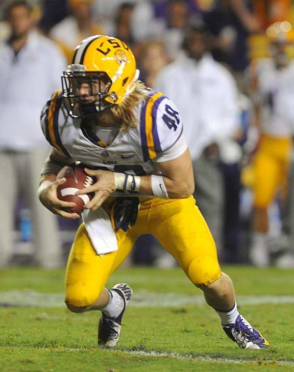 LSU senior linebacker Seth Frug&#233; (48) fakes a field goal kick Saturday, September 21, 2013, during the Tigers' 35-21 victory against Auburn in Tiger Stadium.