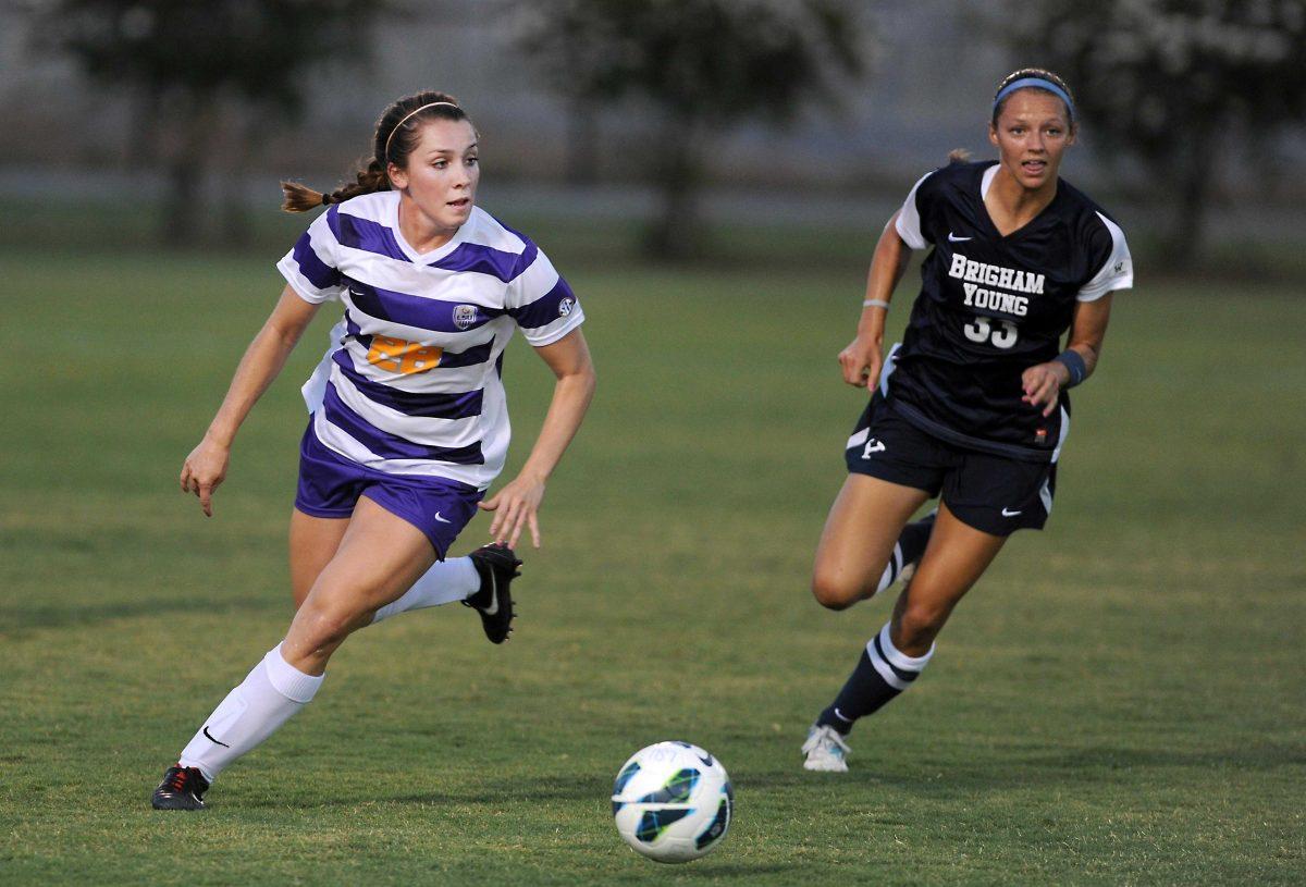 LSU sophomore midfielder Tori Sample (28) dribbles the ball downfield Monday, Sept. 2, 2013 as the Tigers faced the BYU Cougars.