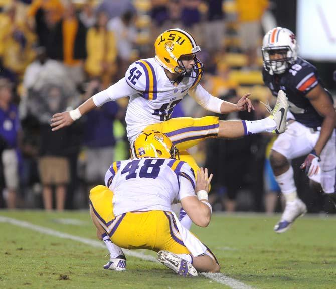 LSU freshman kicker Colby Delahoussaye (42) kicks a field goal Saturday, September 21, 2013, during the Tigers' 35-21 victory against Auburn in Tiger Stadium.