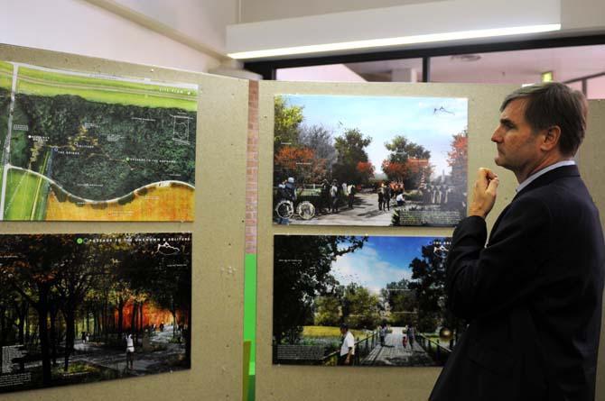 Representatives from Carbo and Associates look over the other possible design for a Battle of New Orleans Monument Friday, Sept. 27, 2013 at the LSU Design Building.