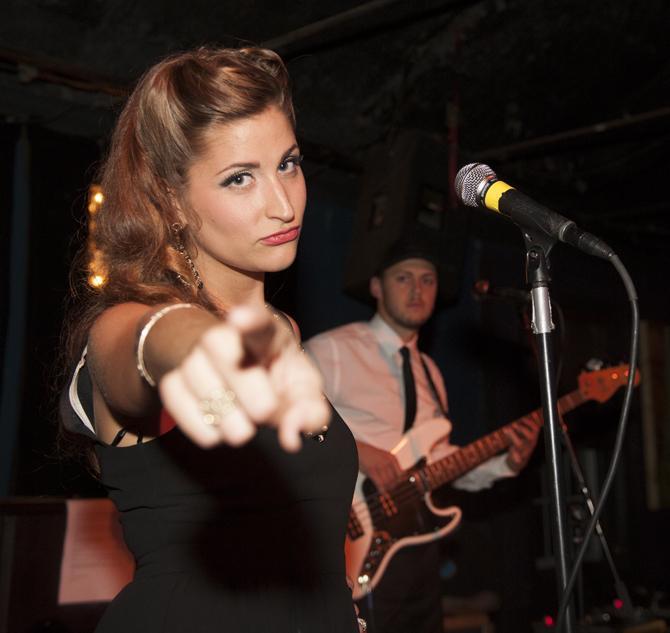 Lucy and the Gamblers' vocalist Lucy Foval points at the crowd Friday, Sept. 20, 2013 at Chelsea's Cafe.