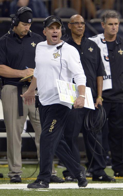 New Orleans Saints head coach Sean Payton calls out from the sideline in the first half of an NFL football game against the Arizona Cardinals in New Orleans, Sunday, Sept. 22, 2013. (AP Photo/Bill Feig)