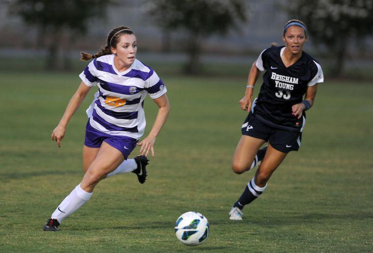 LSU sophomore midfielder Tori Sample (28) dribbles the ball downfield Monday, Sept. 2, 2013 as the Tigers faced the BYU Cougars.