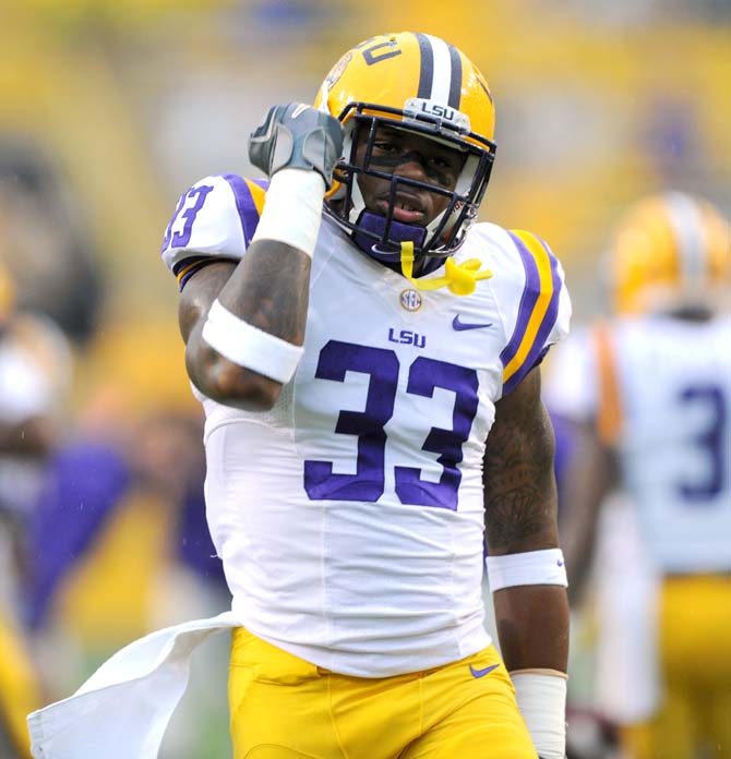 LSU sophomore running back Jeremy Hill (33) pumps his fist Saturday, Sept. 21, 2013 before the Tigers' 35-21 victory against Auburn in Tiger Stadium.