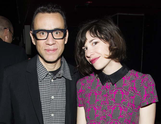 FILE - This April 11, 2013 file photo originally released by IFC shows Fred Armisen, left, and Carrie Brownstein of the series "Portlandia," at IFC's 2013-14 Upfront Unexpectaganza in New York. The cable channel IFC said Wednesday it's picking up the show for two more seasons. They will premiere early next year and in 2015. Brownstein says the show will continue on the longer-narrative path, with more exploration of the dark side. (AP Photo/IFC, Charles Sykes, file)