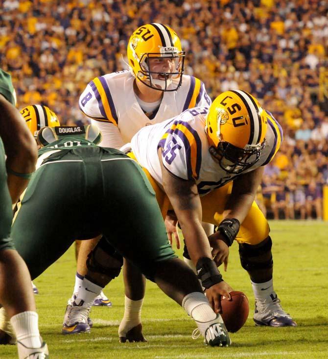 LSU senior quarterback Zach Mettenberger directs his offense Sept. 7, 2013 during the 56-17 victory against UAB in Tiger Stadium