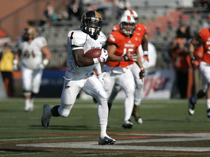 Kent State's Dri Archer (1) runs the ball into the end zone on a 79-yard run during the first half of an NCAA college football game against Bowling Green, , Saturday, Nov. 17, 2012, in Bowling Green, Ohio.