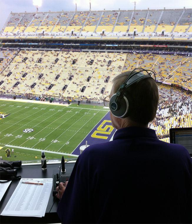 LSU’s stadium public address announcer Dan Borne makes an announcement Sept. 7, 2013 before the Tiger's 56-17 victory against UAB in Tiger Stadium.