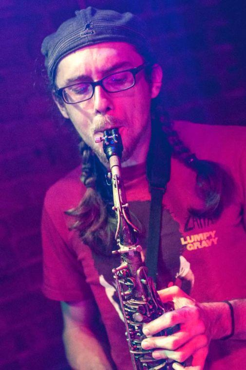 Matt Bizot, saxophonist and flautist for intergalactic space funk band Captain Green, jams on stage Saturday, Sept. 14, 2013 at The Spanish Moon.