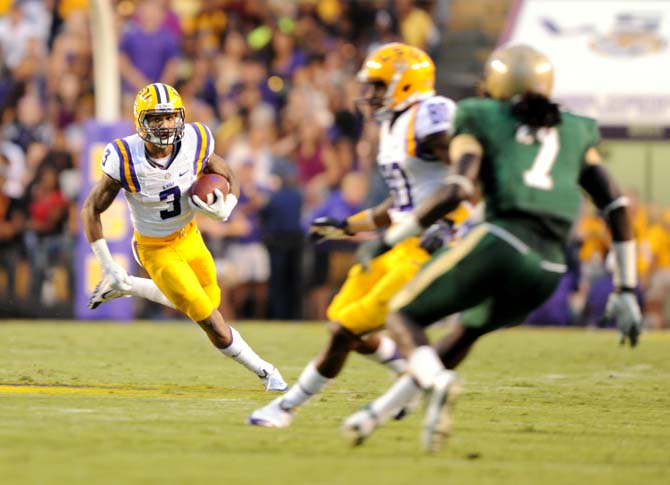 LSU junior wide reciever Odell Beckham Jr. runs the ball Sept. 7, 2013 during the 56-17 victory agaisnt UAB in Tiger Stadium.