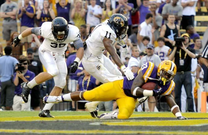 LSU sophomore running back Jeremy Hill (33) scores a touchdown Saturday, Sept. 14, 2013 during the Tiger's 45-13 victory in Tiger Stadium