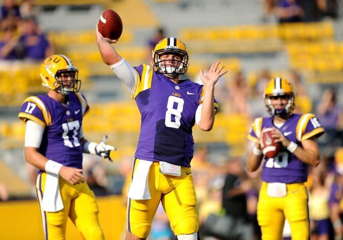 LSU senior quarterback Zach Mettenberger (8) warms up Saturday, September 14, 2013 before the Tigers' 45-13 victory against Kent State.