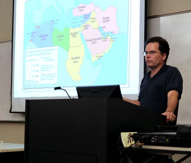 LSU students and faculty discuss the involvement of the U.S. with Syria with Leonard Ray, political science associate professor, Monday Sept. 9, 2013 about in Howe Russell Hall.